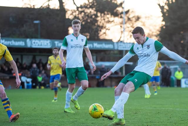 Dan Smith scores Bognor's equaliser against Kingstonian in Febraury - one of 25 goals he has scored for the Rocks this season / Picture: Chris Hatton