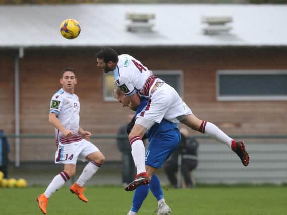 Gary Elphick gets up for Hastings against AFC Dunstable / Picture: Scott White
