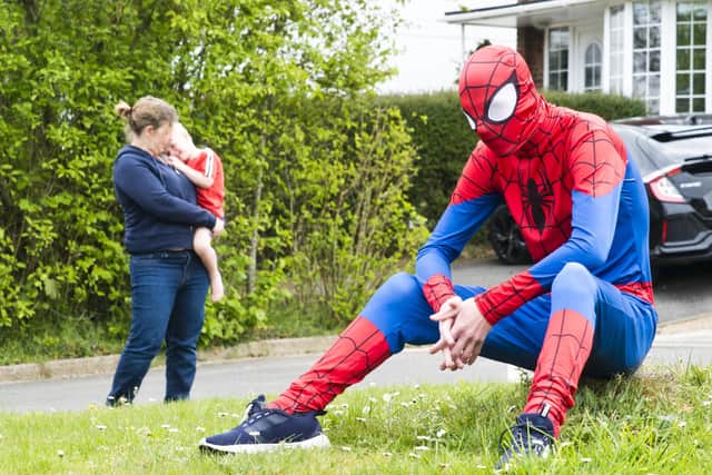 Kieran Thompson, dressed as Spiderman, is bringing joy to the people of Burgess Hill. Picture: Eddie Howland