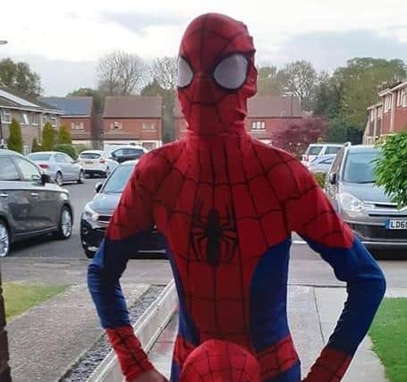 Superhero Kieran with his brother