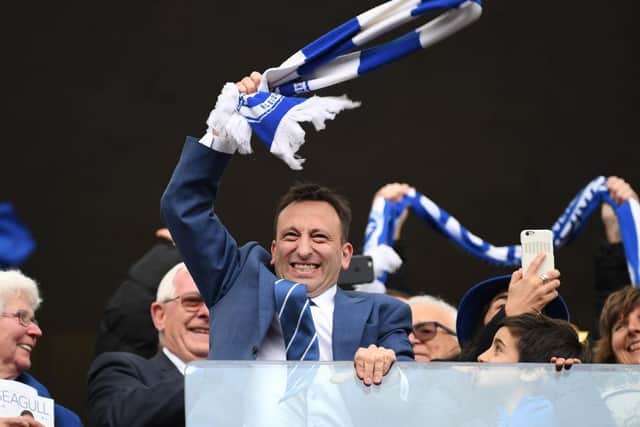 Albion chairman Tony Bloom leads the celebrations