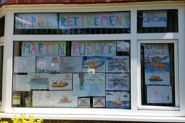 The drawings created by local children to decorate his home. Photo: Helen Rudwick