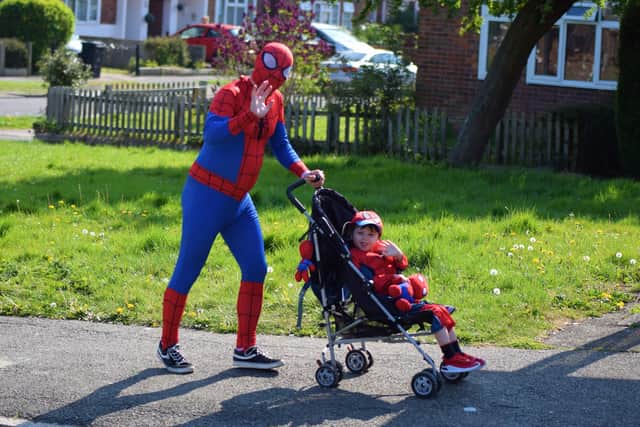 The pair walked round the neighbourhood to put a smile on people's faces - Photo by Dan Jessup