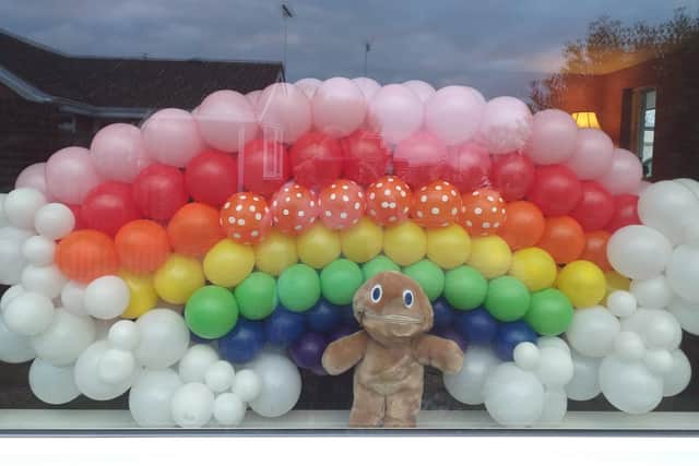 Rainbow of balloons