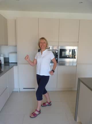 Helen Crabb from Horsham walked a marathon around her kitchen