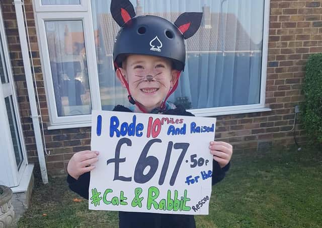 Animal-lover Arlan West cycled and walked ten miles in six days to raise 1,000 for the Cat & Rabbit Rescue Centre