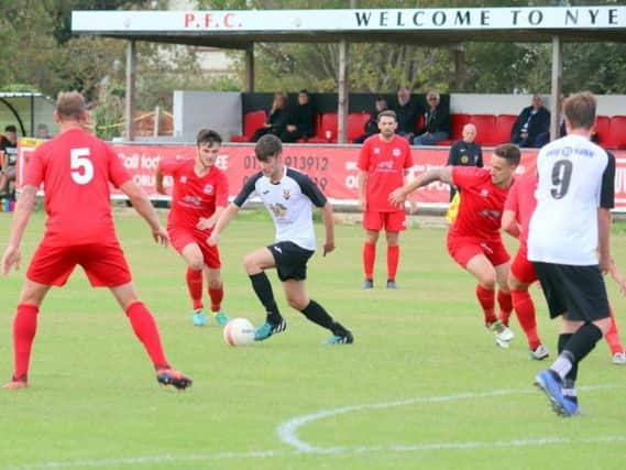 Crawley Down Gatwick's first team in action at Pagham / Picture: Roger Smith