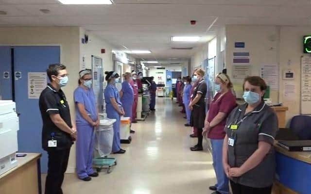 Eastbourne DGH staff hold a miute's silence for those who have died of coronavirus