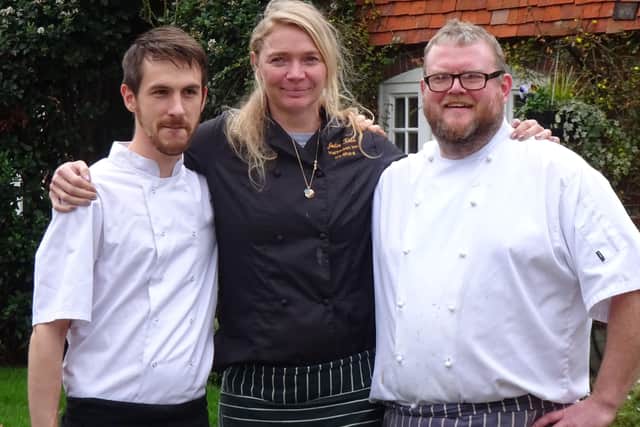 Jodie pictured with some of her staff when the Half Moon opened in 2017