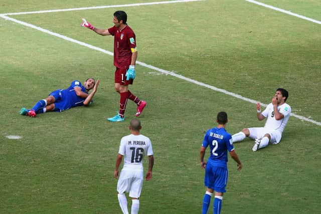 1 Luis Suarez bitess Giorgio Chiellini in Uruguay v Italy 2014 World Cup group match