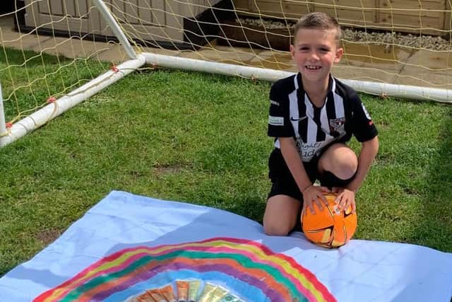 Henfield FC U8s player Toby Fyfe, is one of 21 players, who have helped raise money for a rainbow of hand creams for frontline heroes