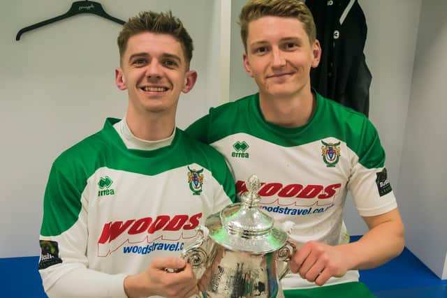 Chad Field and Doug Tuck with the Sussex Senior Cup at the end of a bittersweet night for the defender / Picture: Tommy McMillan