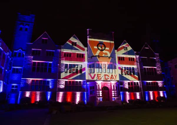 The front of Roedean School in Brighton, Sussex is lit up wit the Union Jack and to celebrate VE Day 75th anniversary ***Pic by David McHugh / Brighton Pictures SUS-200705-144241001