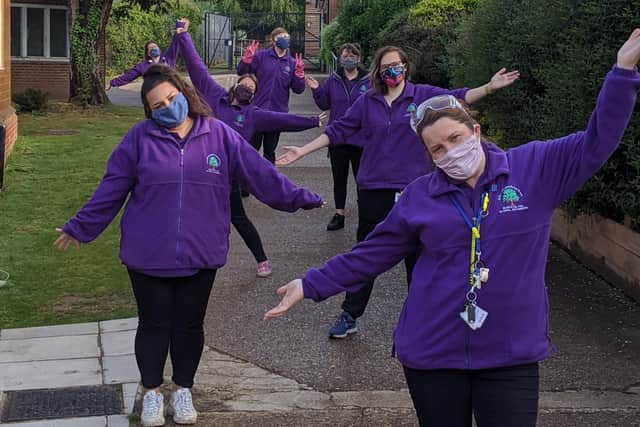 Staff at St Joseph’s Specialist Trust wearing some of the homemade masks