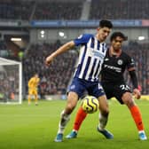 Brighton and Hove Albion midfielder Steven Alzate in action against Chelsea
