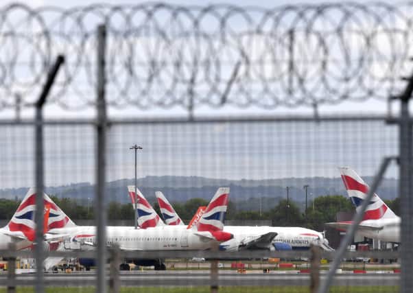 Aircraft grounded at Gatwick Airport (Photo by BEN STANSALL/AFP via Getty Images)