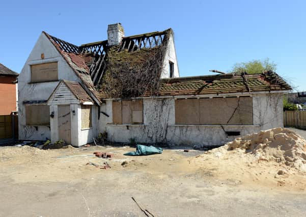 The burnt out house pictured in 2018