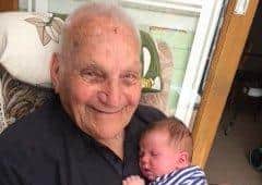 Lewis Earl with his youngest grandson