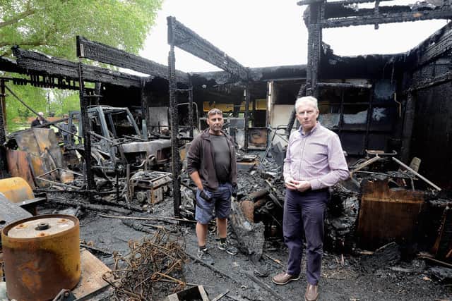 Mark Chapman burser at The Prebendal School, right, and Andy Saint, groundsman by the remains of the pavilion last year. Photo: Kate Shemilt ks190288-2