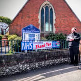 The Rev James Grant says a public thank you to the nurses outside St Giles' Church in Shoreham