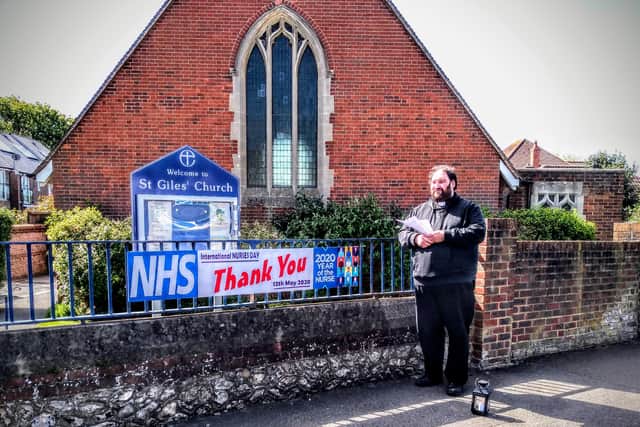 The Rev James Grant says a public thank you to the nurses outside St Giles' Church in Shoreham