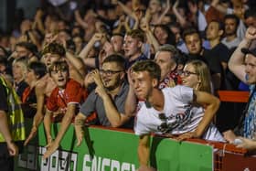 Crawley Town fans celebrate the win against Norwich in the Carabao Cup. Picture by PW Sporting Photography
