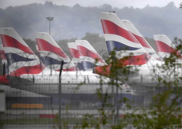 Aircraft grounded at Gatwick Airport (Photo by Ben STANSALL / AFP) (Photo by BEN STANSALL/AFP via Getty Images) SUS-200405-122520001
