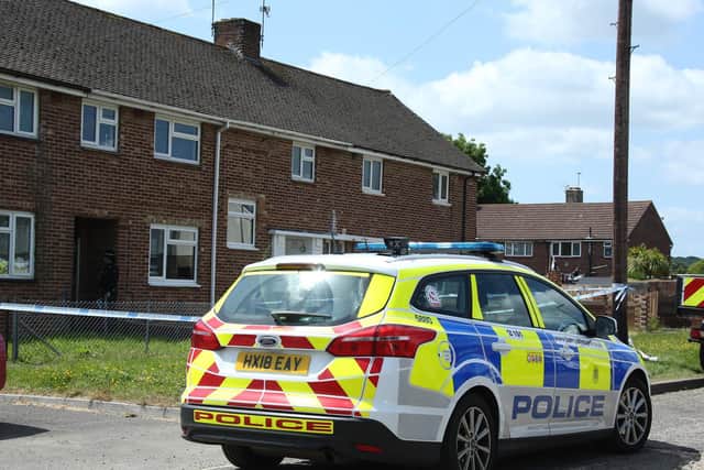 Two men have been arrested on suspicion of murder after the incidentat an address in Tichborne Grove, which also left a27-year-old woman with serious injuries
