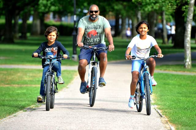 A family cycling in Burgess Hill. Picture: Steve Robards