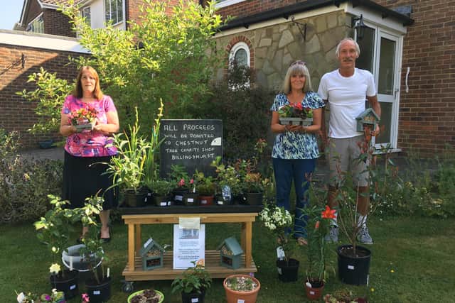 Angie and Keith Blackman, right, with Vicki Pidgley at their stall in Vicki’s driveway in Silver Lane, Billingshurst