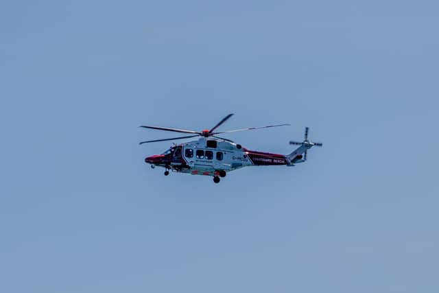 A helicopter near to the scene. Picture: Daniel Moon