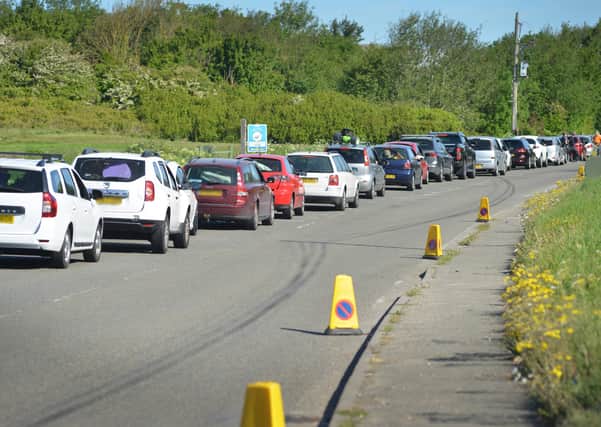 Queueing at one of East Sussex's rubbish tips on the day it reopened