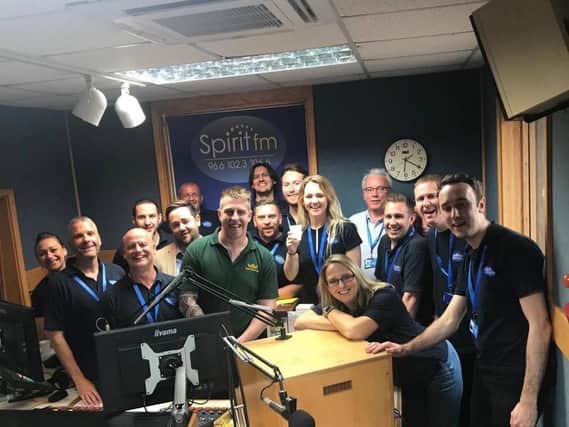 The Spirit FM team on local radio day. From left to right in that photo are:  Milly Luxford, Stuart McGinley, Ian Crouch, Alex Berry, Neale Bateman, Steve Freegard, Gary Booker, Ryan Burrows, India Ede, Sally Austin, Zoe Bryant, Peter Phillips and Ollie Coleshill.  Not pictured are Jo Symes, Kaya Bryant, Jess Clements, Aaron Whitham and Anna Bingham.