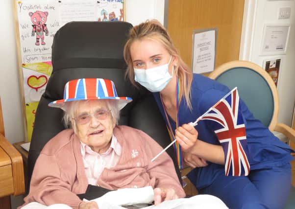 A staff member and resident at Valerie Manor care home