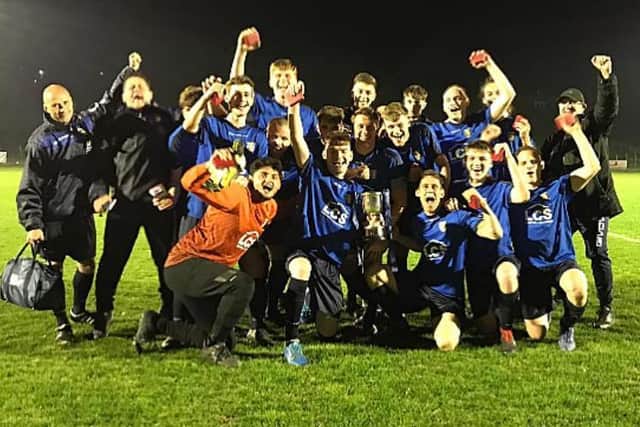 Sedlescombe Rangers celebrate winning a trophy