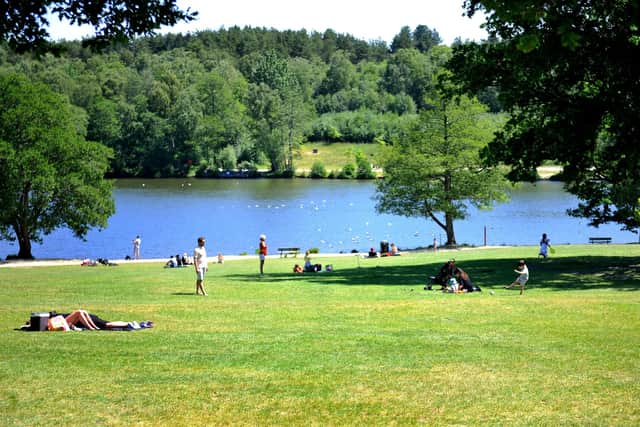 People enjoy the sun at Tilgate Park, Crawley. Pic Steve Robards