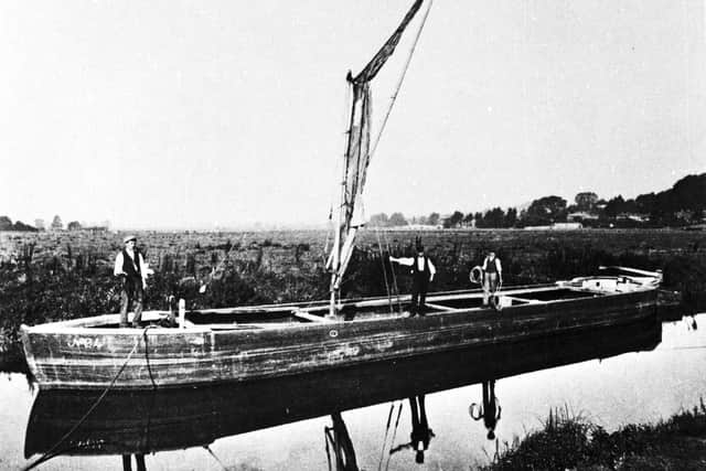 A barge on the River Arun around 1885