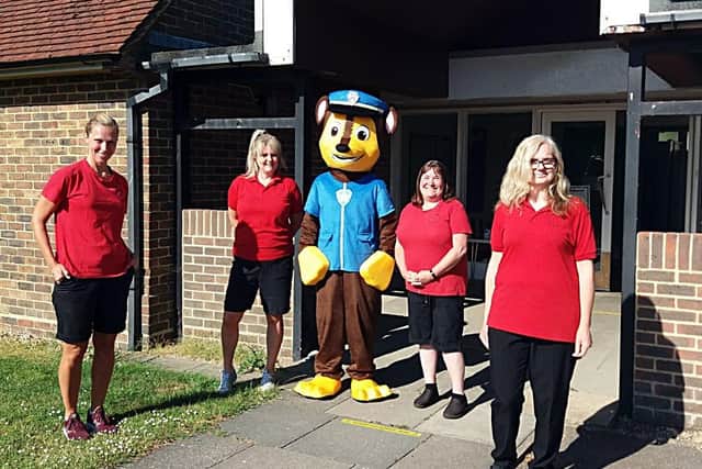 Chase from Paw Patrol with staff at Goring Methodist Pre-School