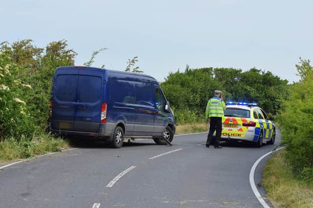 Police at the scene in Wartling Road - photo by Dan Jessup SUS-200306-100935001