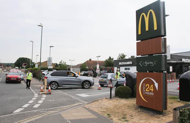 Dozens of vehicles queued for McDonald's and the recycling centre SUS-200306-141735001