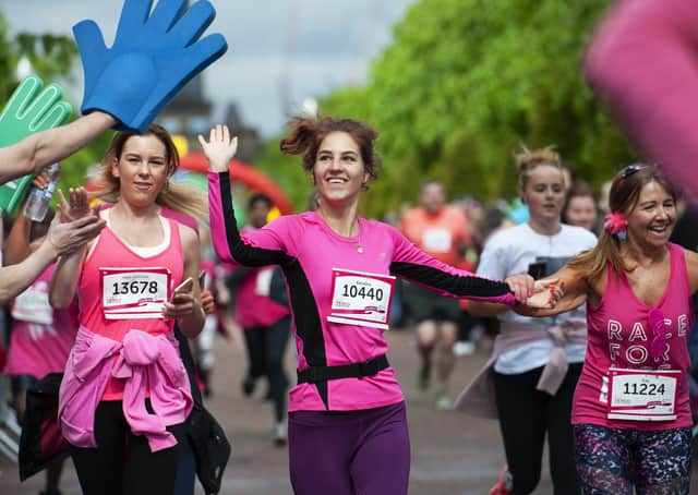 PICTURES COURTISEY OF CANCER RESEARCH UKFIRST USE ONLYRunners at the finish line.Race for Life Glasgow 2019. SUS-200406-140953001