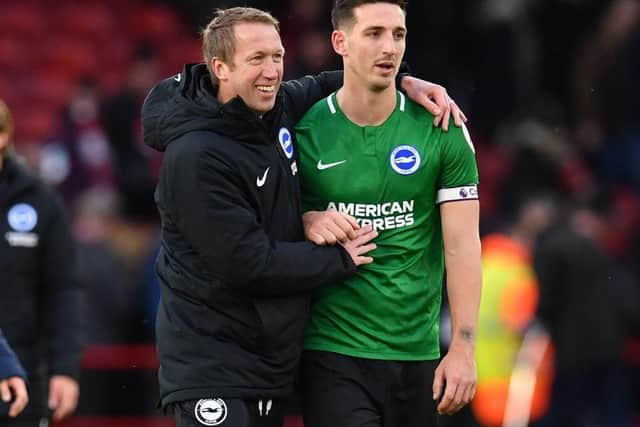 Brighton and Hove Albion head coach with his skipper Lewis Dunk