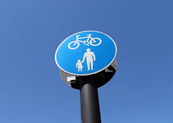 A pedestrian and cyclist sign  in Aylesbury. Photo by Catherine Ivill/Getty Images