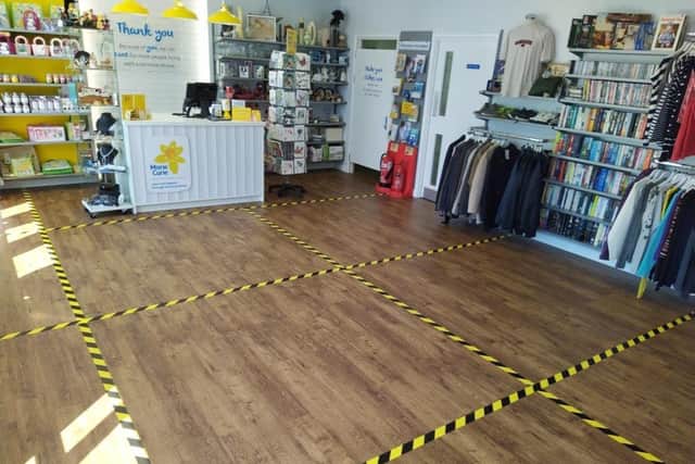 Safety measures are in place at the Marie Curie shop in Langney Shopping Centre SUS-201206-114321001
