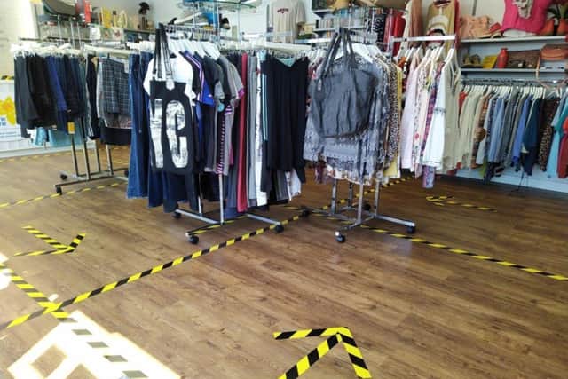 Safety measures are in place at the Marie Curie shop in Langney Shopping Centre SUS-201206-114332001