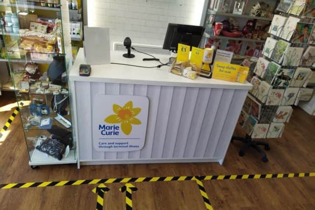 Safety measures are in place at the Marie Curie shop in Langney Shopping Centre SUS-201206-114343001