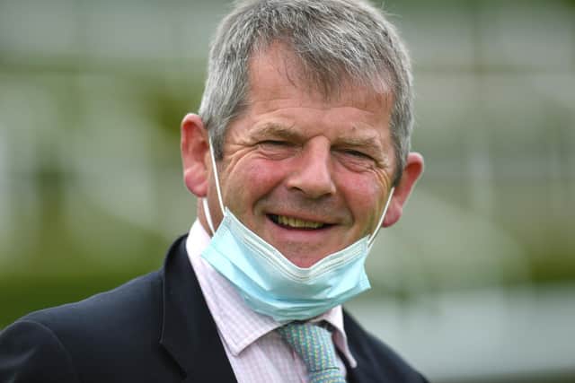 Masked man: Trainer Joseph Tuite looks on after Lullaby Moon wins the Coral Beaten by a Length Free Bet EBF Fillies Novice Stakes / Picture: Getty