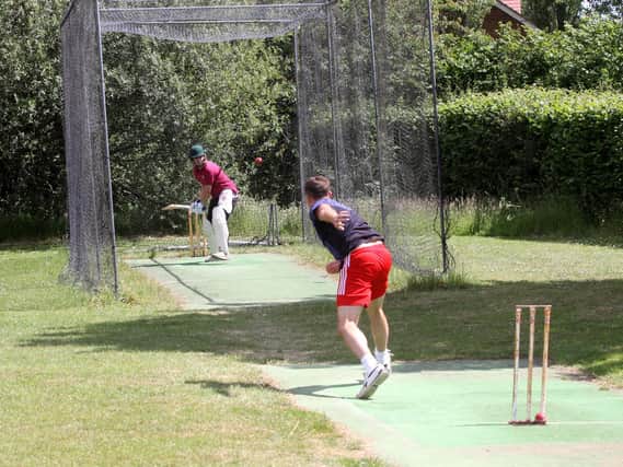 Lee Atkinson and James Fellows in the nets at Isfield CC / Picture by Ron Hill