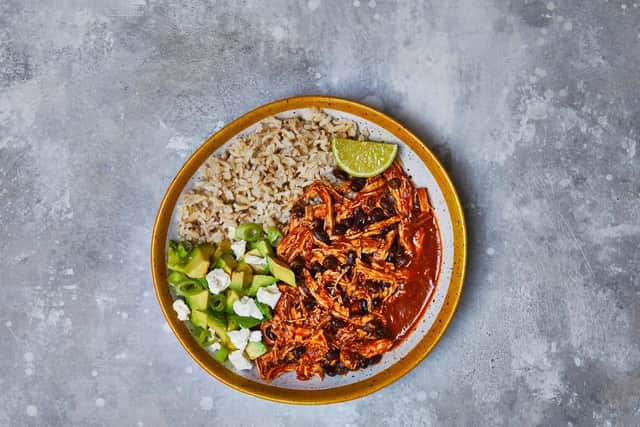 Spicy chicken chilli with feta and avocado
