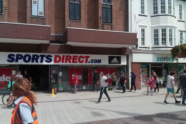 Shoppers queuing for Sports Direct